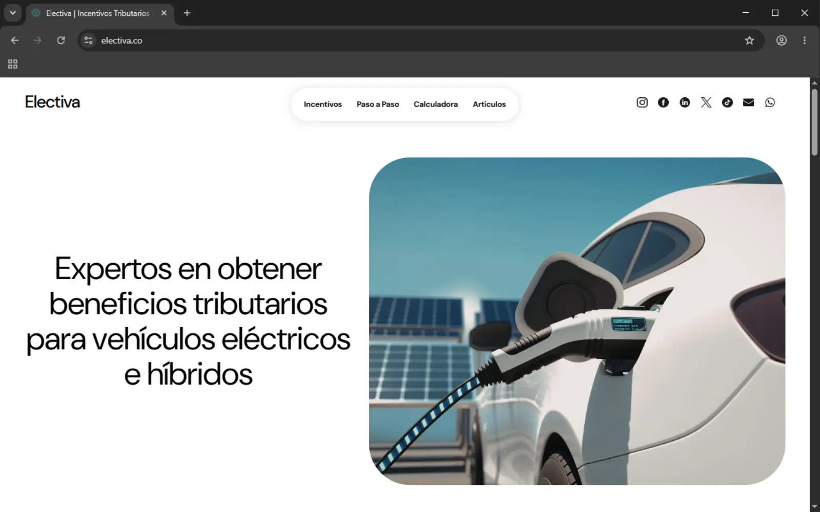 The Electiva homepage on desktop, showing the hero section with the line about tax benefits for electric and hybrid vehicle owners in Colombia.